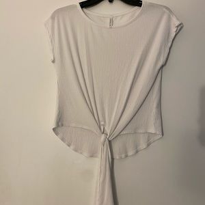 White tee with tie knot at the bottom